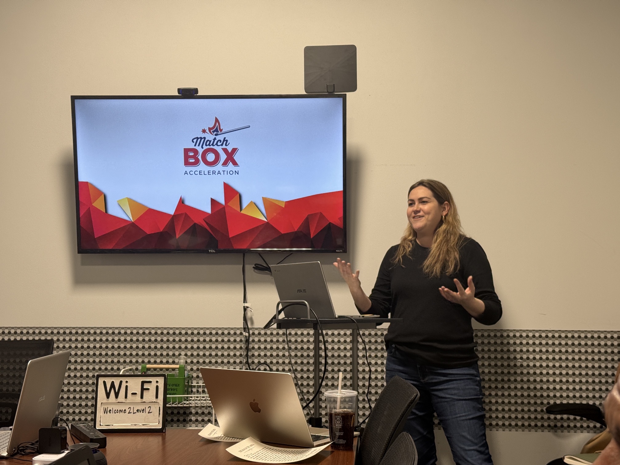 Image of a joyful presenter in the business accelerator program.